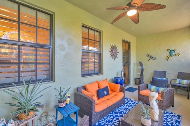 view of patio featuring outdoor lounge area and ceiling fan