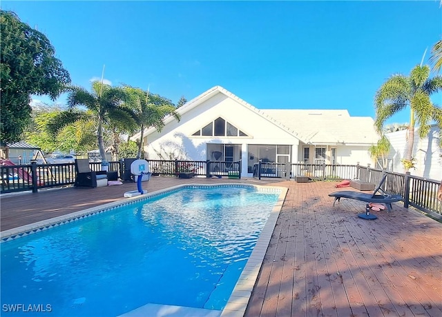 view of pool featuring a wooden deck