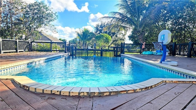 view of pool featuring a deck