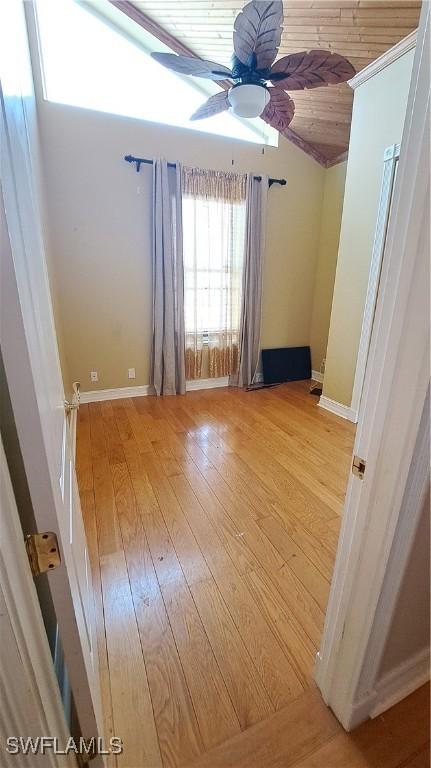 empty room featuring light hardwood / wood-style flooring and ceiling fan