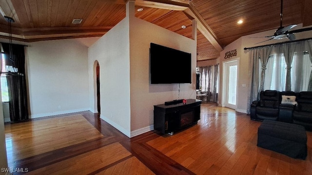 living room with hardwood / wood-style floors, vaulted ceiling, ceiling fan, and wood ceiling