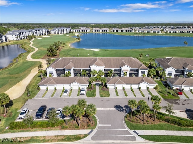 drone / aerial view with a water view