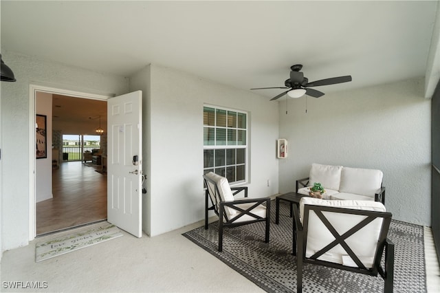 view of patio featuring ceiling fan and an outdoor living space