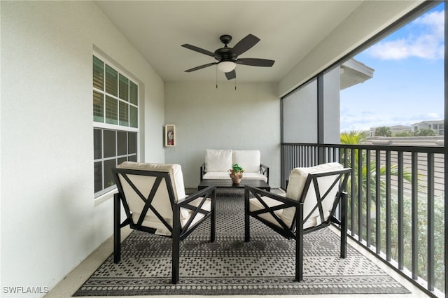 balcony featuring ceiling fan