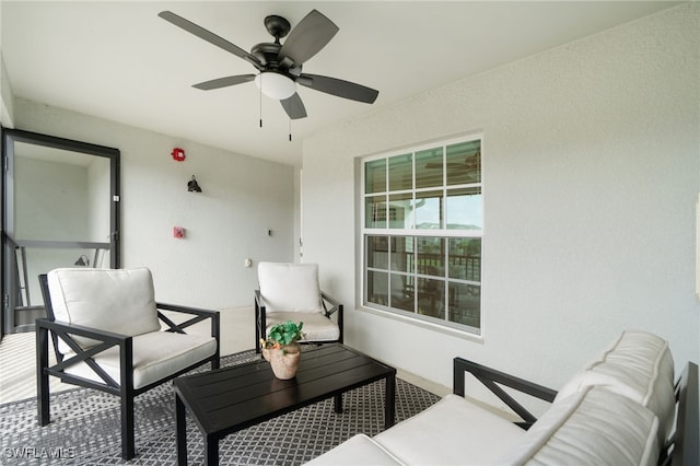 view of patio featuring ceiling fan and an outdoor hangout area