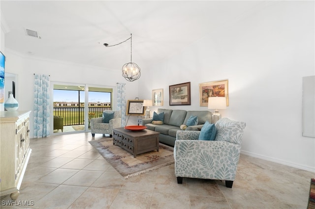 tiled living room with an inviting chandelier and crown molding