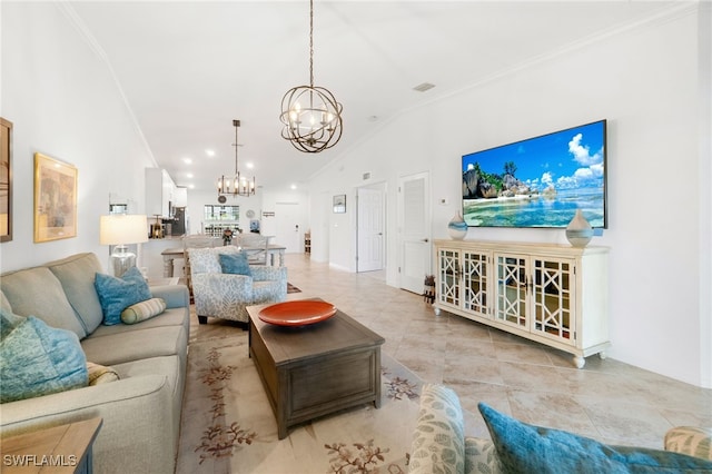 living room with a chandelier, light tile patterned floors, ornamental molding, and lofted ceiling