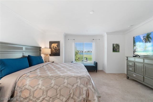 carpeted bedroom with crown molding