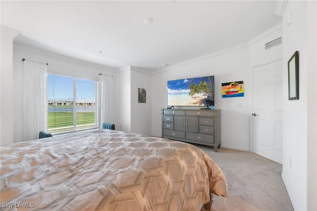 carpeted bedroom featuring crown molding