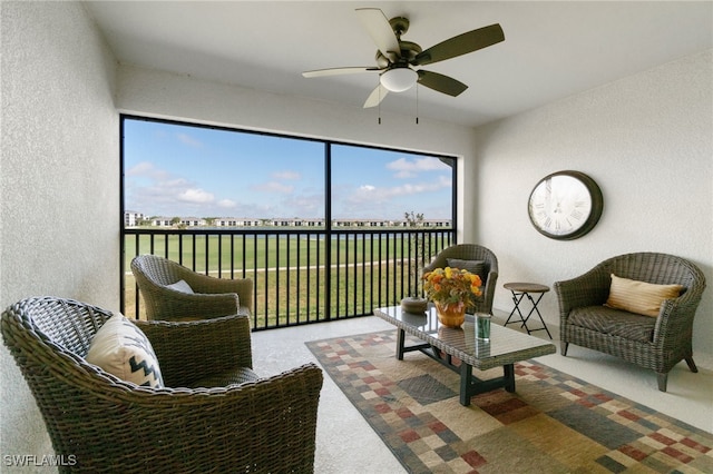 sunroom with ceiling fan and a healthy amount of sunlight