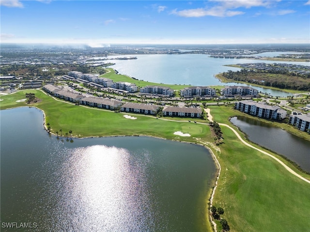 bird's eye view with a water view