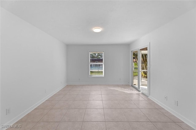 view of tiled spare room