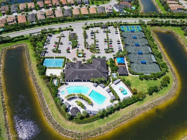 birds eye view of property featuring a water view