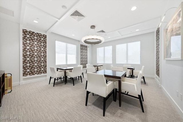 view of carpeted dining space