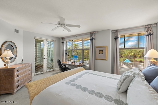 bedroom featuring access to outside, ceiling fan, french doors, and light carpet