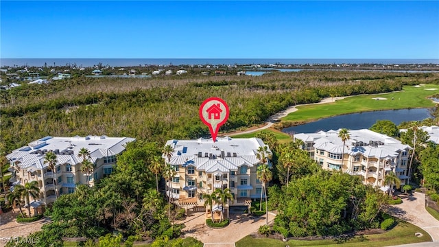 bird's eye view with a water view