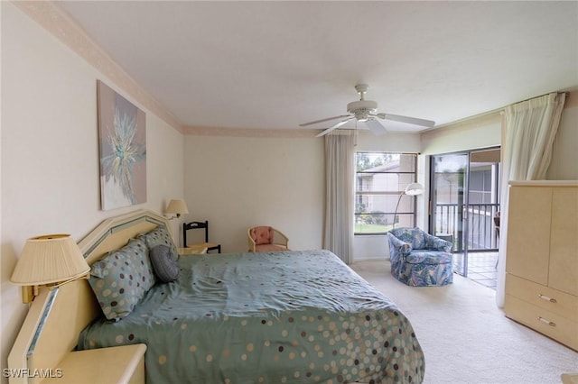 bedroom with light carpet, access to exterior, ceiling fan, and crown molding