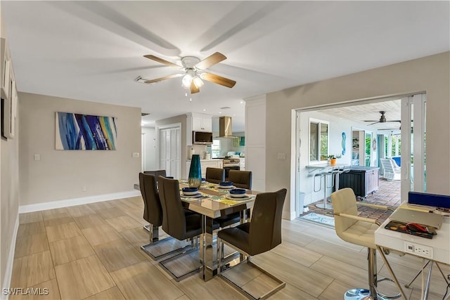 dining space with ceiling fan