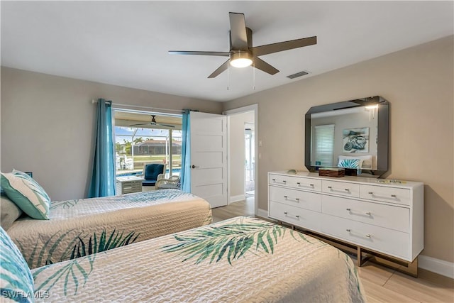 bedroom featuring ceiling fan and light hardwood / wood-style floors