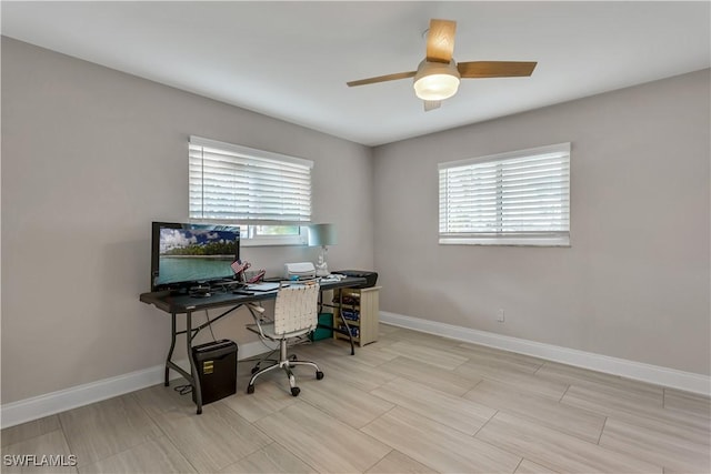 office area with ceiling fan