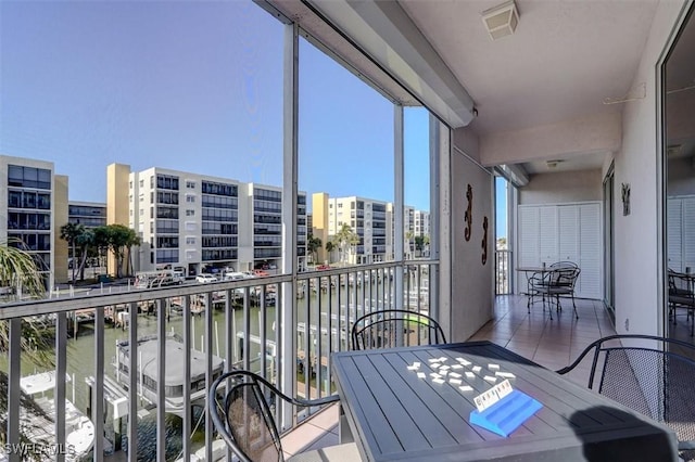 balcony featuring a water view