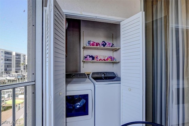 laundry room with washer and dryer