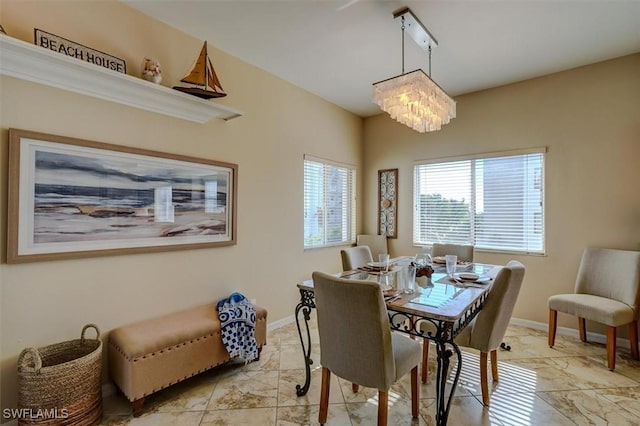 dining area with a chandelier