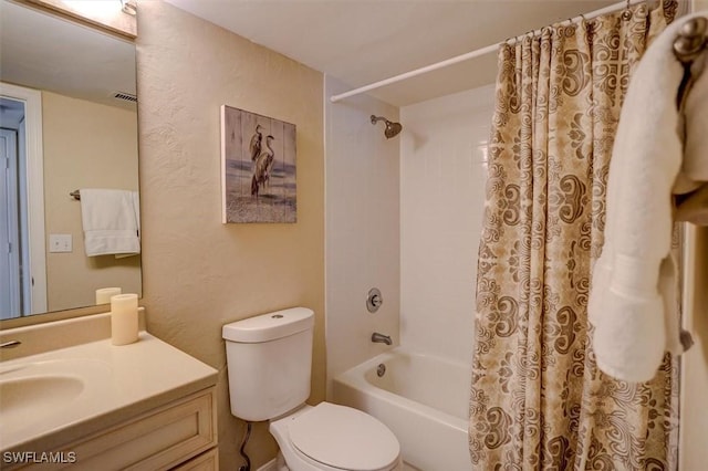 full bathroom with vanity, toilet, and shower / bathtub combination with curtain