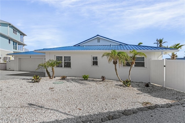 view of property exterior featuring a garage