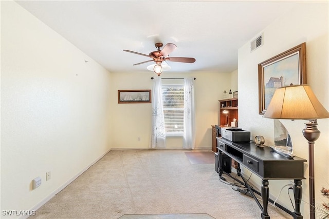 interior space with ceiling fan and light carpet