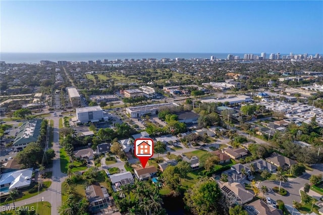 aerial view with a water view and a view of city