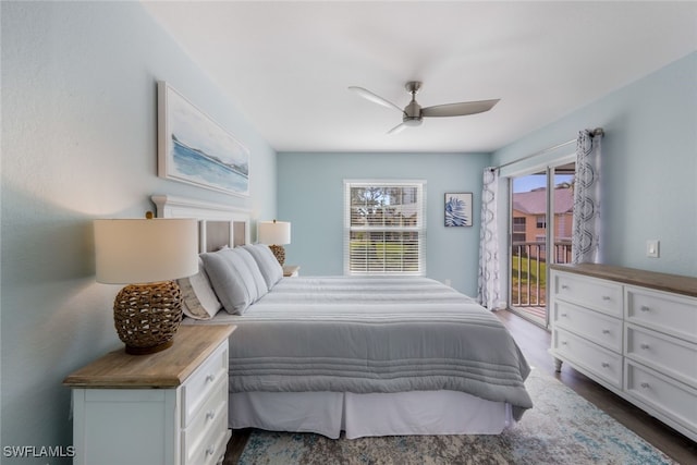 bedroom with dark hardwood / wood-style floors, access to outside, and ceiling fan