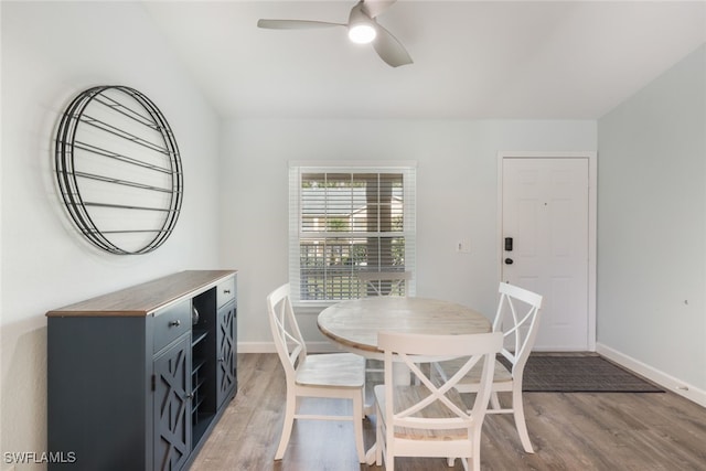 dining area featuring ceiling fan and hardwood / wood-style floors