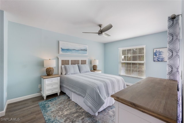 bedroom featuring dark hardwood / wood-style flooring and ceiling fan