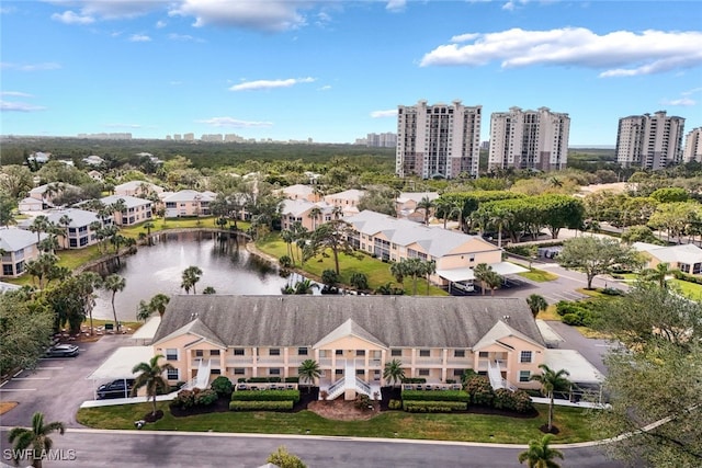 drone / aerial view featuring a water view