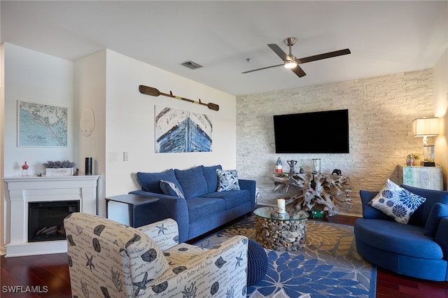 living room with dark hardwood / wood-style floors and ceiling fan