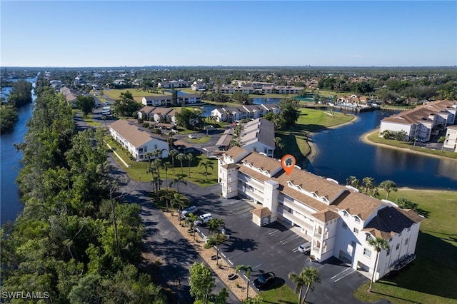 drone / aerial view featuring a water view