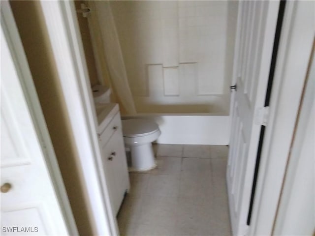 full bathroom with toilet, shower / tub combination, vanity, and tile patterned floors