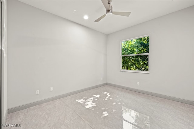 empty room featuring ceiling fan