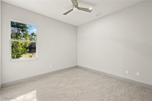 empty room featuring ceiling fan