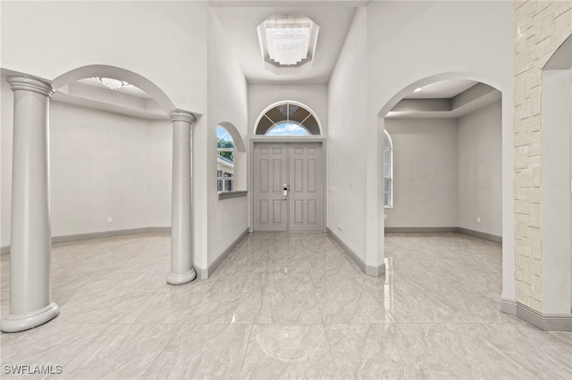 entrance foyer with a towering ceiling