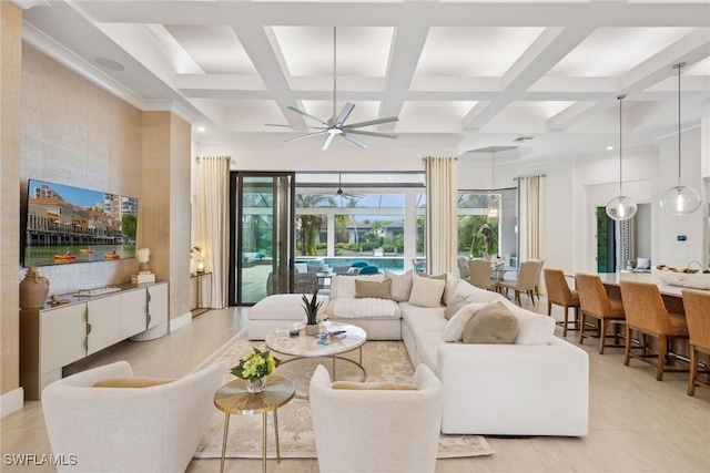 living room with ceiling fan, beamed ceiling, and coffered ceiling