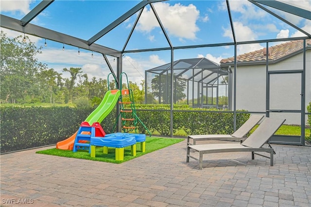 view of patio / terrace with glass enclosure