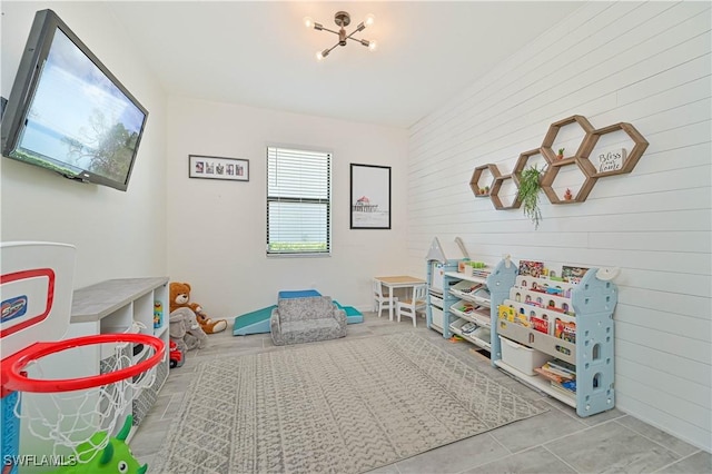 playroom with a chandelier