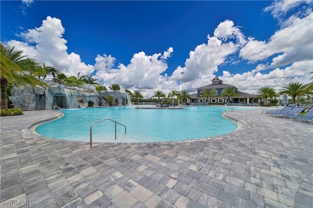 view of swimming pool with a gazebo and a patio area