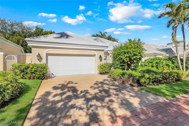 view of front of house with a garage