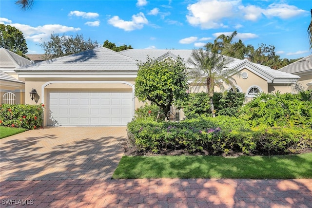 view of front of property featuring a garage