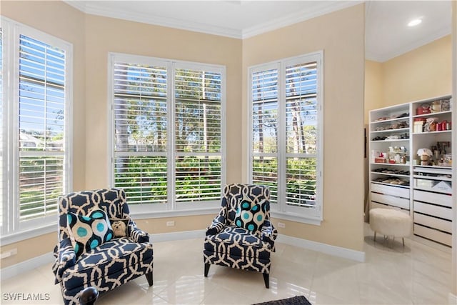 sitting room featuring light tile patterned floors and ornamental molding