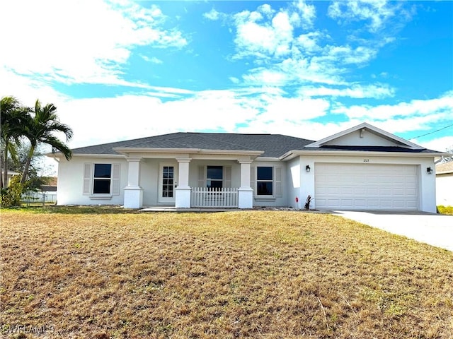 single story home featuring a front yard, a porch, and a garage