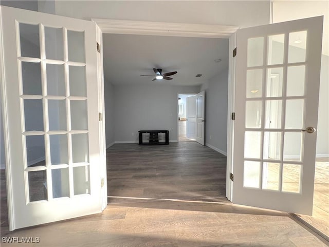 interior space featuring hardwood / wood-style flooring and ceiling fan